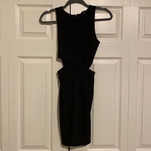 Black mini dress with waist cutouts